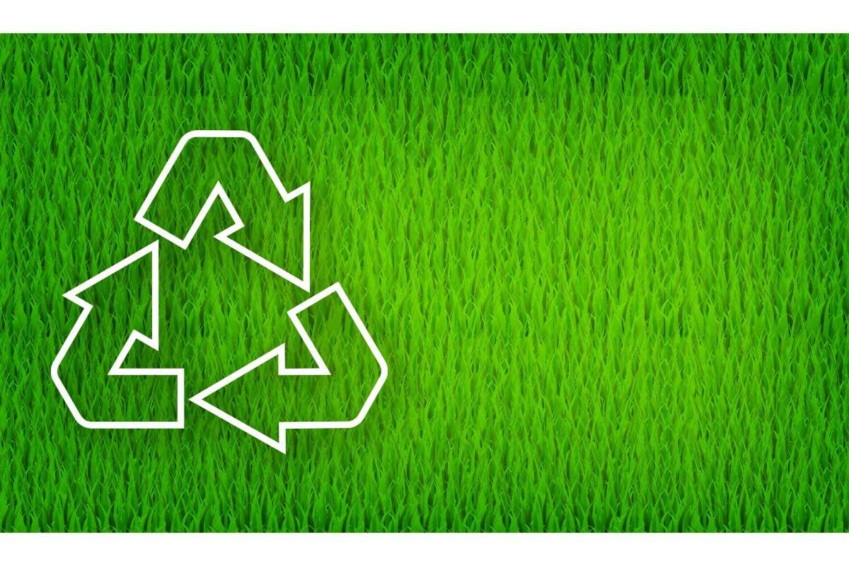 Recycling Symbol on Green Background.
